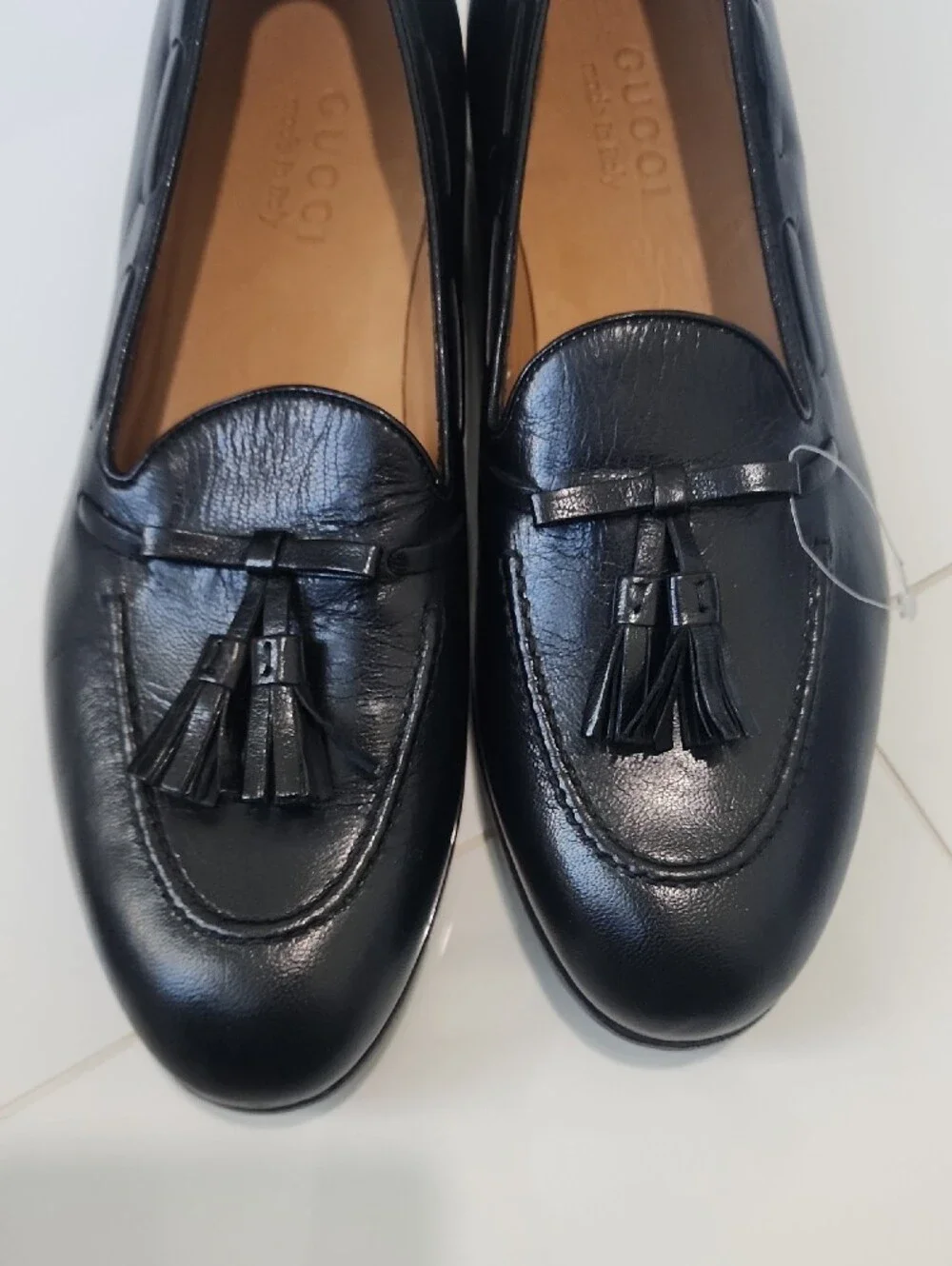 Gucci Black Leather Tassel Loafers with Gold Cat Accent